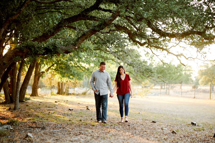 Warm emotions and warm pretty light add up to a scene we loved capturing. Mercedes Morgan Photography, Austin engagement photographers, captured in our outdoor photography studio