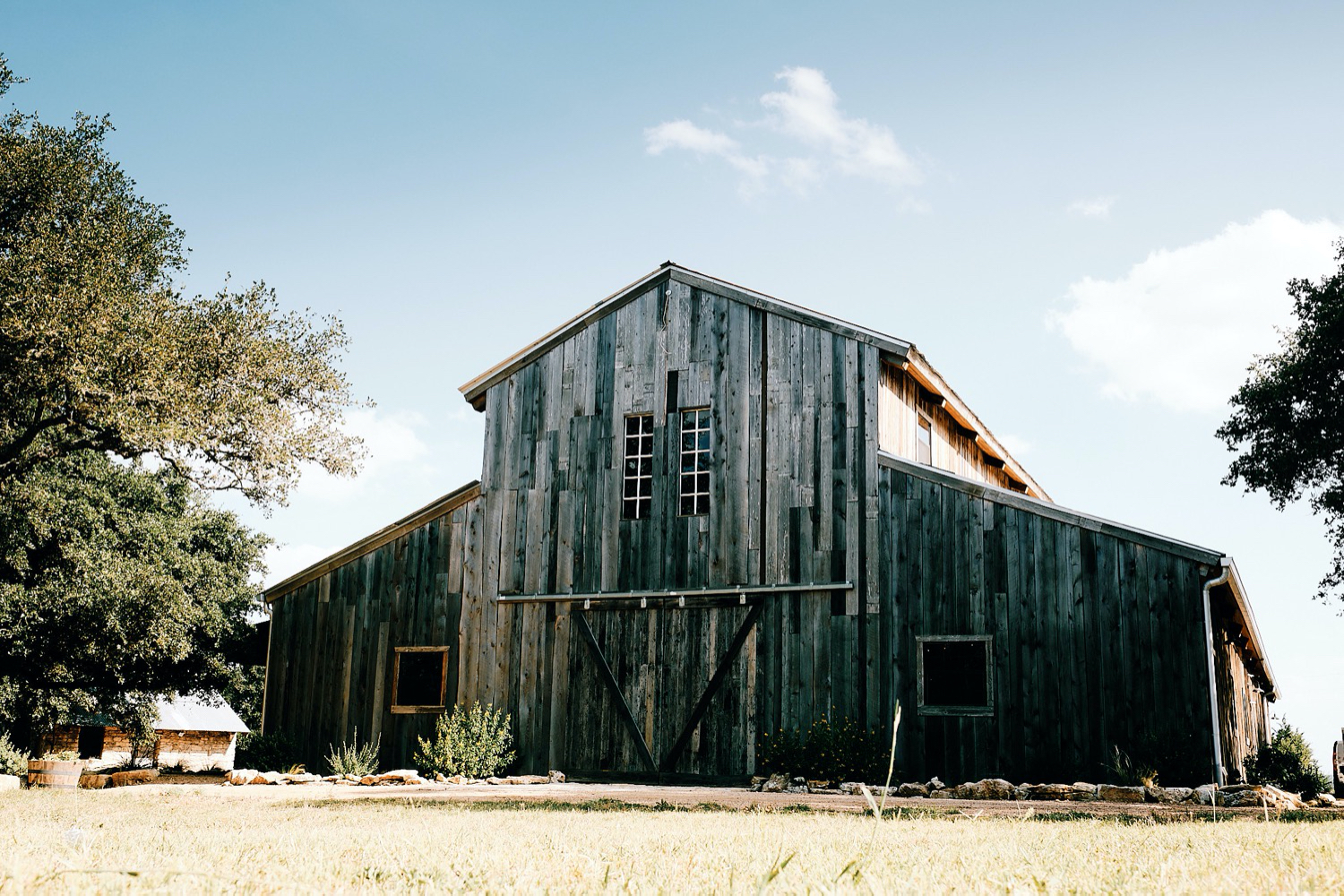 Stone House Ranch's hall where Zoe and Adam had their Texas Hill Country reception venue. Photography by Mercedes Morgan Photography, Austin wedding photographers