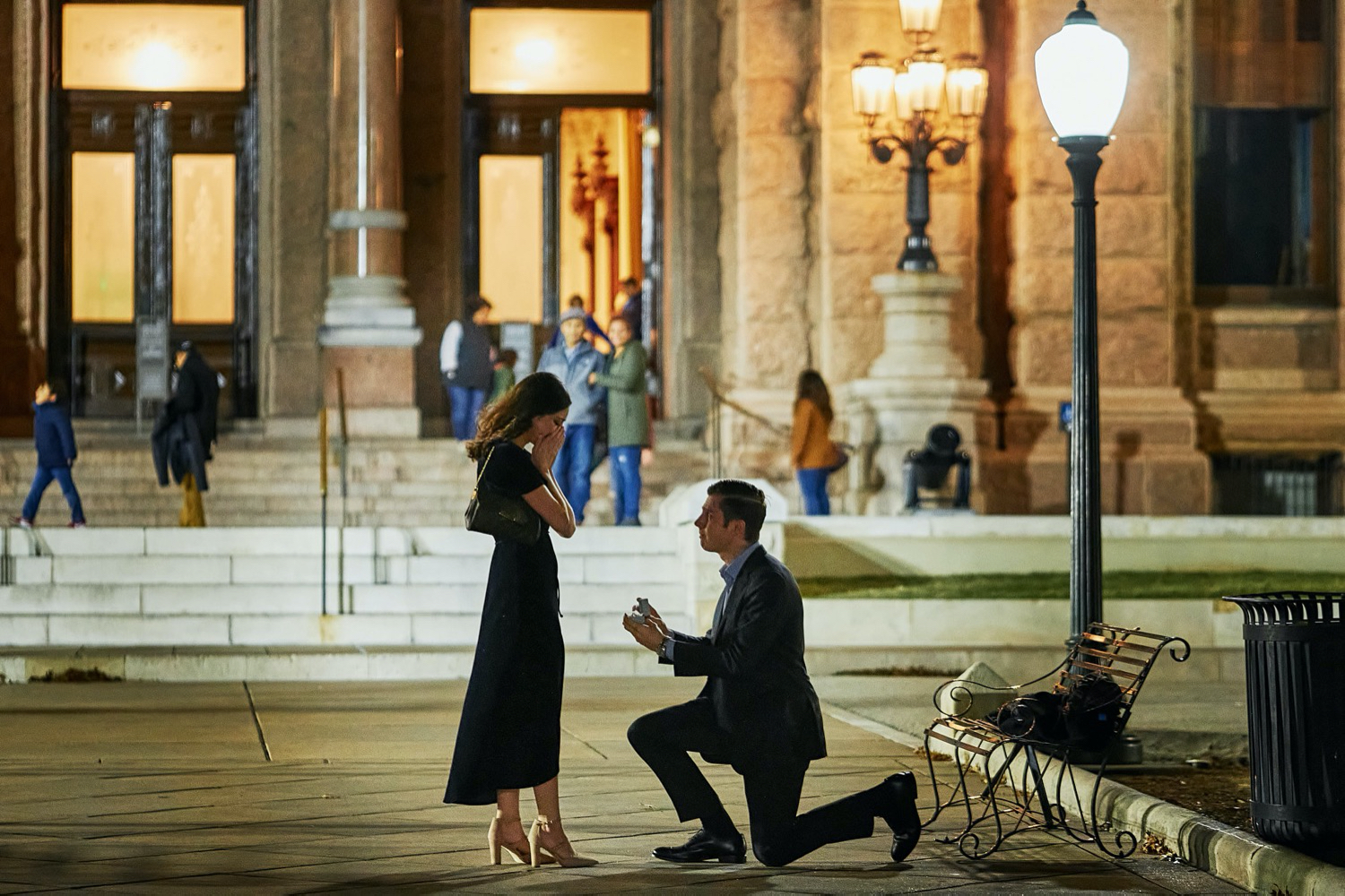 Thomas proposes to Celia on the main walkway of the Texas State Capital building in Austin, Texas by Austin proposal photographers Mercedes Morgan Photography