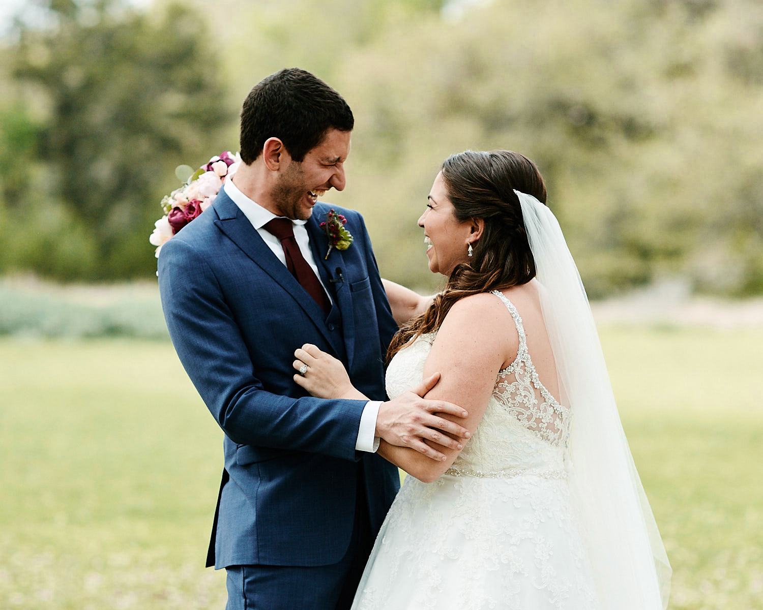 Jon and Ivy had the most ecstatic reactions to their first look! Photograph by Austin wedding photographer Mercedes Morgan Photography taken at Ivy and Jon's Addison Grove wedding.